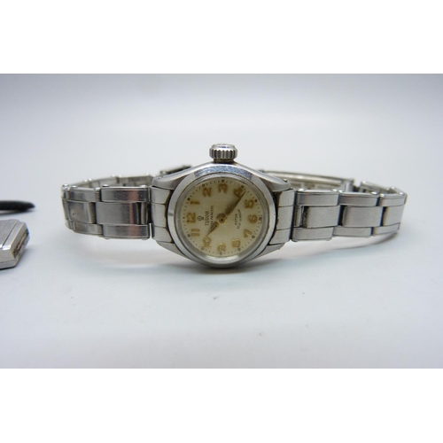 973 - A lady's Tudor wristwatch, a lady's Rolex wristwatch lacking crown and a Rolex movement