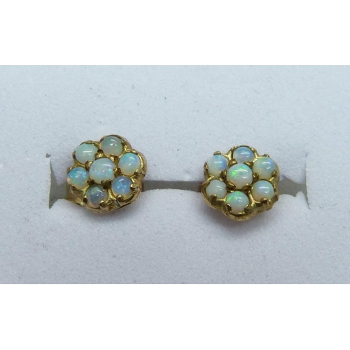 975 - A pair of 9ct gold and opal cluster ear studs, 0.8g