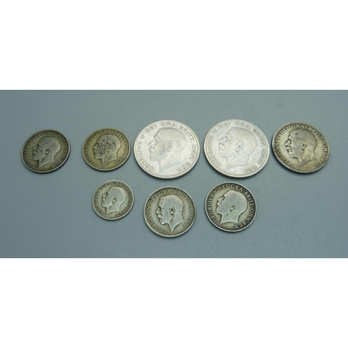 977 - Two 1920's half crowns and other 1920 to 1946 silver coins, 63g