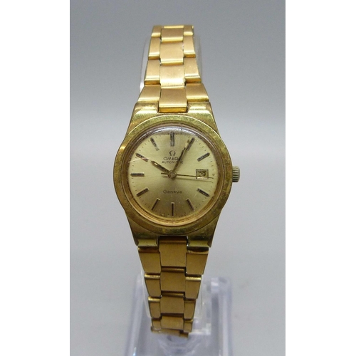 979 - A lady's Omega automatic date wristwatch, boxed