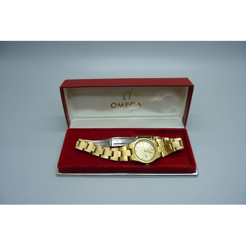 979 - A lady's Omega automatic date wristwatch, boxed