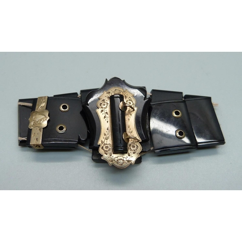 991 - A jet bracelet with yellow metal buckle detail, a/f