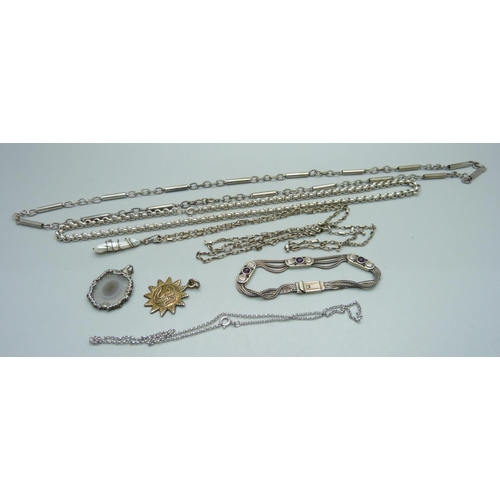 999 - Three silver chains, a silver bracelet and two silver pendants, 89g, and a white metal chain with pe... 