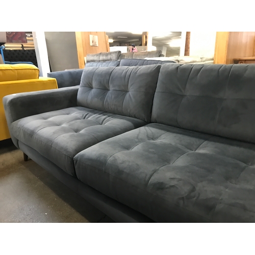 1468 - A slate velvet pinched back four seater sofa