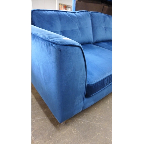 1436A - A blue velvet pinched back 2.5 seater sofa