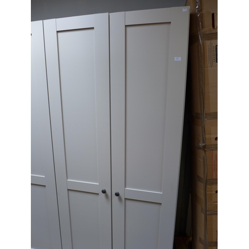 1489 - A truffle painted four door full hanging wardrobe  * This lot is subject to VAT