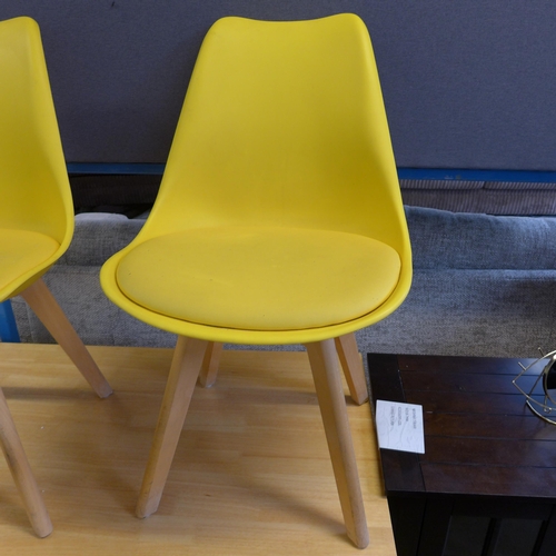 1524 - An oak fixed top dining table with set of four yellow upholstered dining chairs - marked