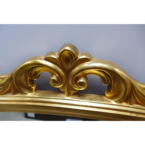 1538 - A large gold gilt framed overmantle mirror