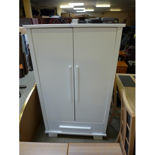 1539 - A white painted two door, single drawer wardrobe