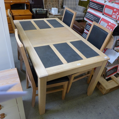 1541 - A beech and stone dining table and four leather effect dining chairs