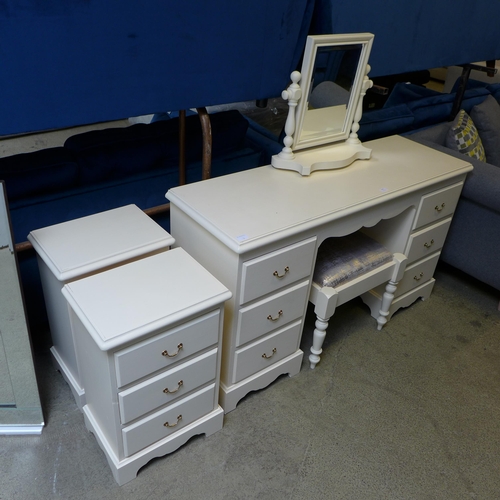 1498 - A cream painted pine six drawer dressing table with mirror, upholstered stool and a pair of three dr... 