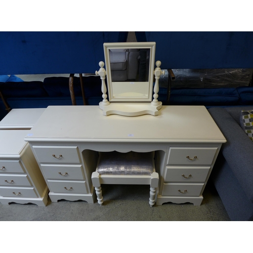 1498 - A cream painted pine six drawer dressing table with mirror, upholstered stool and a pair of three dr... 