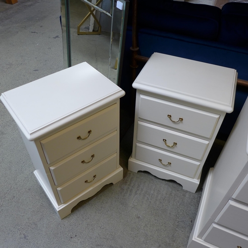 1498 - A cream painted pine six drawer dressing table with mirror, upholstered stool and a pair of three dr... 