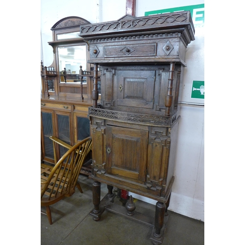 102 - A 19th Century Flemish carved oak credence cupboard