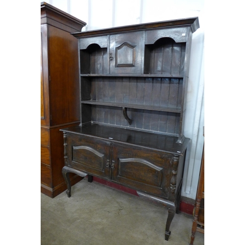 104 - A George III style oak dresser