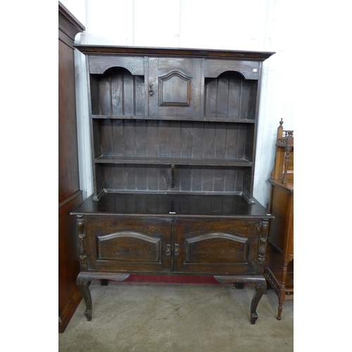 104 - A George III style oak dresser