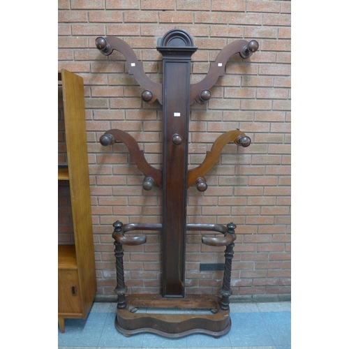 108 - A Victorian mahogany free shaped coatstand