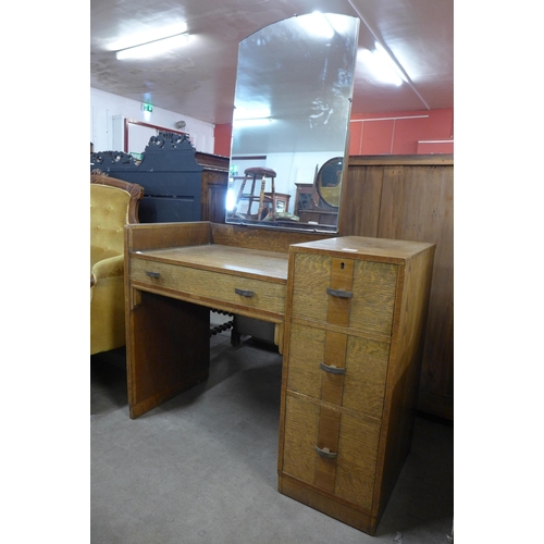 110 - A Waring & Gillows Art Deco oak dressing table