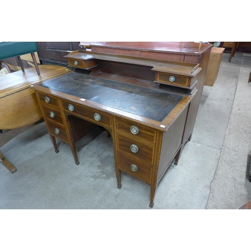 115 - A late Victorian Warings inlaid mahogany desk