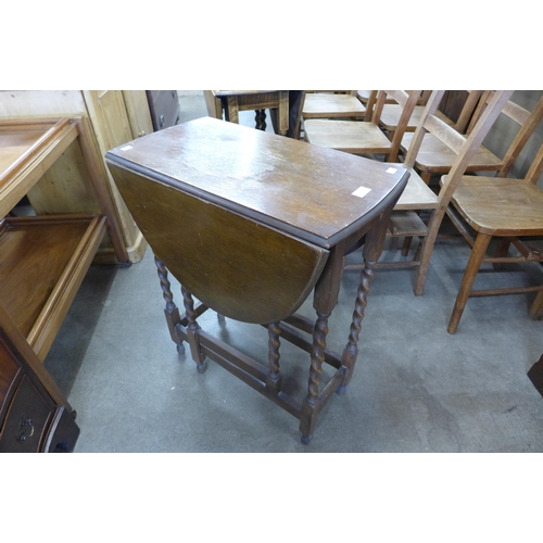 119 - A small oak barleytwist gateleg table