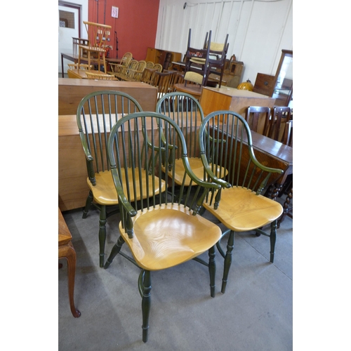 129 - A set of four painted elm Windsor armchairs