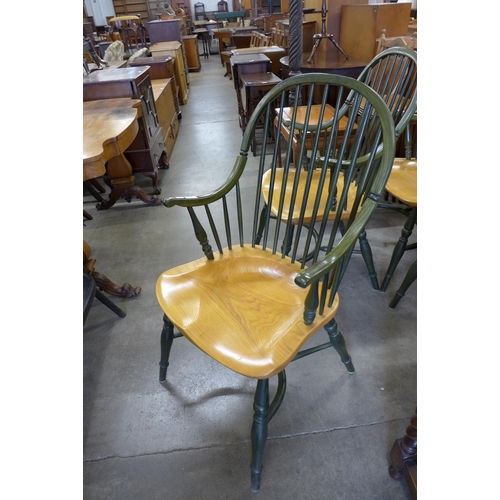 129 - A set of four painted elm Windsor armchairs