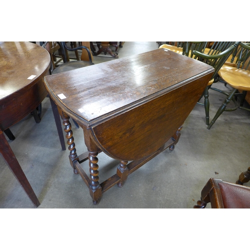 130 - An oak barleytwist gateleg table