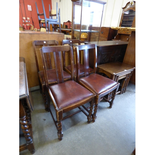 131 - A set of four oak barleytwist dining chairs