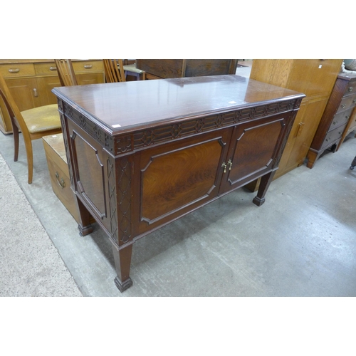 144 - An Edward VII Chippendale Revival mahogany two door washstand