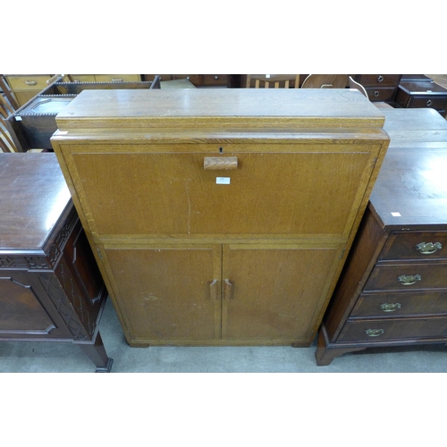 145 - An Art Deco oak students bureau