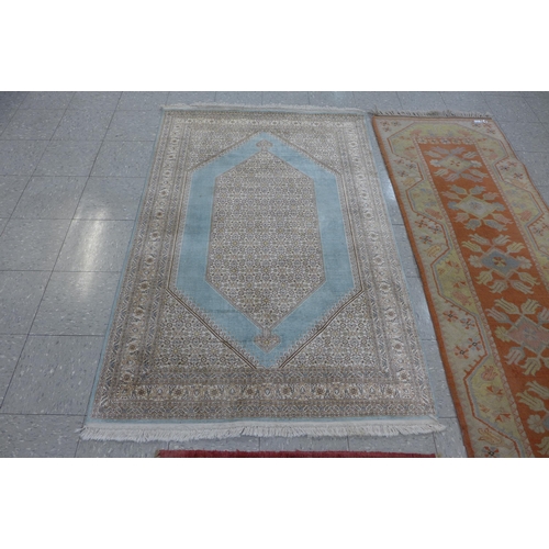 147 - Three assorted rugs