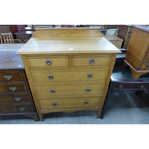 148 - An Edward VII inlaid satin birch chest of drawers