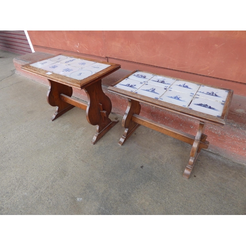 150C - Two oak coffee tables, inset with Delft blue and white tin glazed tiles