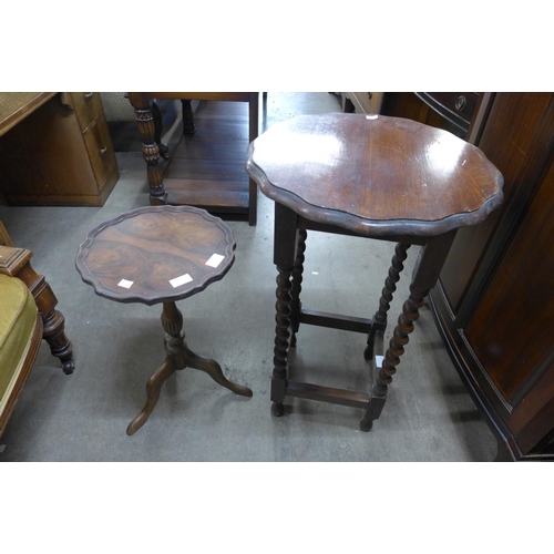 155 - A circular oak barleytwist occasional table and a walnut tripod wine table