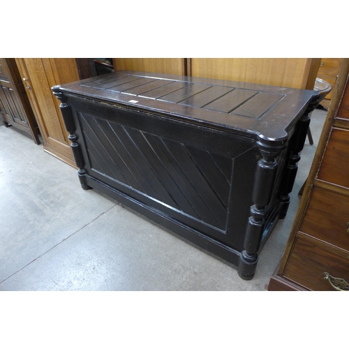 156 - A Victorian Aesthetic Movement stained pitch pine coffer