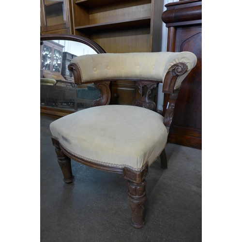 158 - A William IV carved mahogany and fabric upholstered library chair