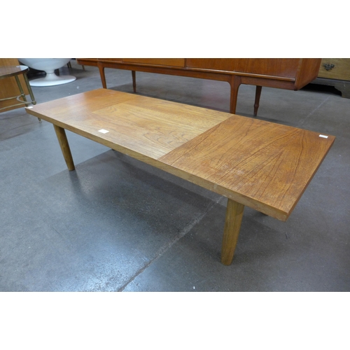 18 - A teak coffee table