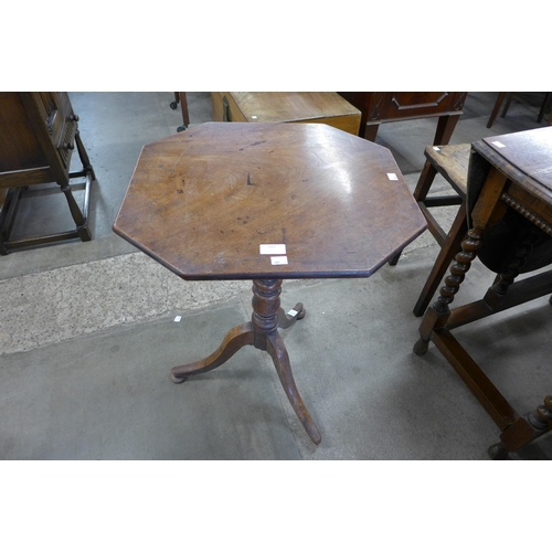 182 - A Victorian mahogany and elm octagonal tripod table