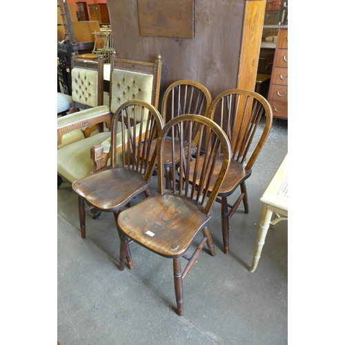 190 - A set of four Victorian elm and beech Windsor kitchen chairs