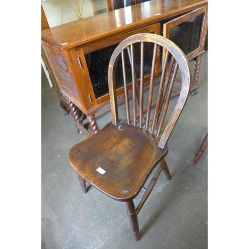 190 - A set of four Victorian elm and beech Windsor kitchen chairs