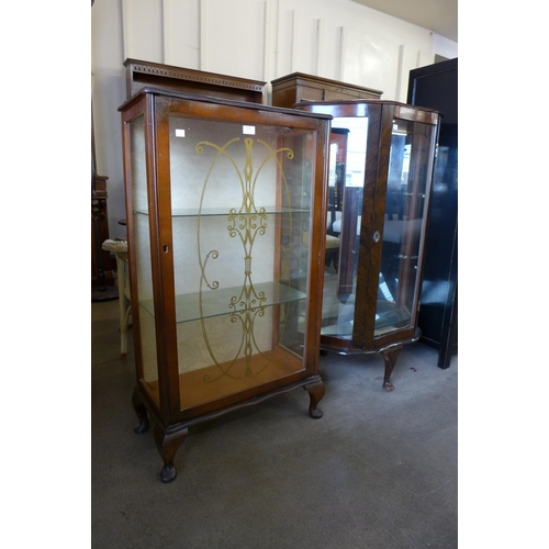 192 - Two walnut display cabinets