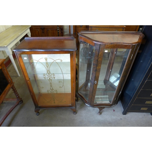 192 - Two walnut display cabinets