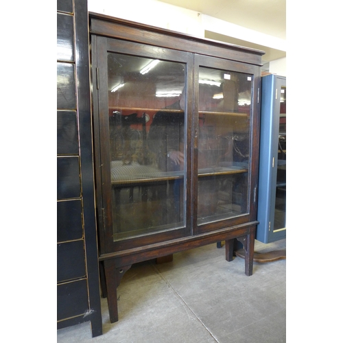 194 - An Edward VII oak two door bookcase