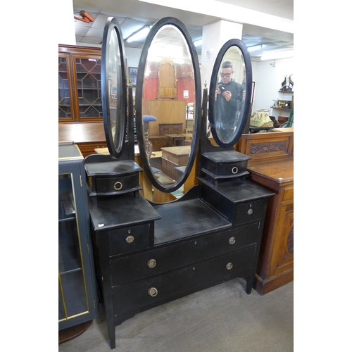 195 - A painted oak side by side bureau bookcase, an ebonised Edward VII dressing table and an inlaid maho... 