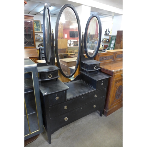 195 - A painted oak side by side bureau bookcase, an ebonised Edward VII dressing table and an inlaid maho... 