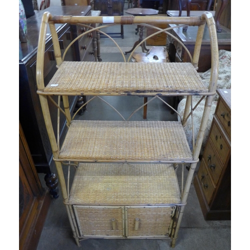 202 - A bamboo and rattan three tier whatnot