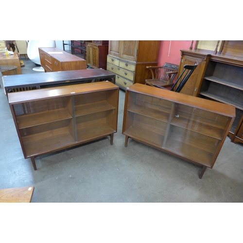 21 - A pair of teak bookcases