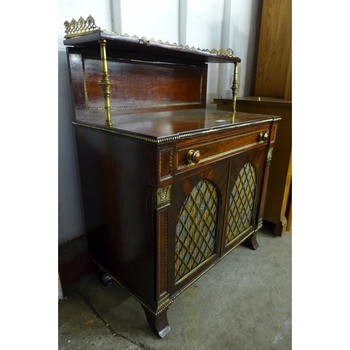 211 - A small Regency rosewood and gilt metal mounted chiffonier