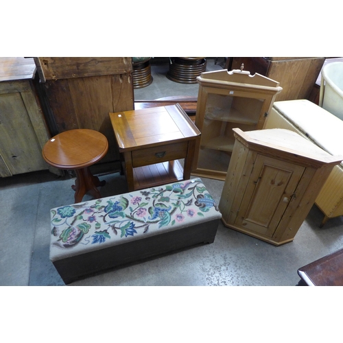 214 - An oak corner cabinet, a pine corner cabinet, two occasional tables and a stool