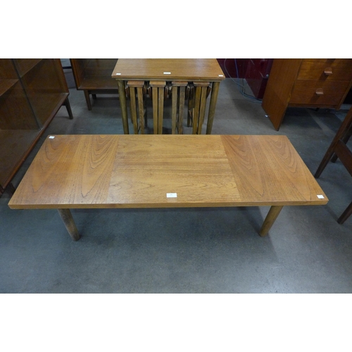 22 - A teak coffee table